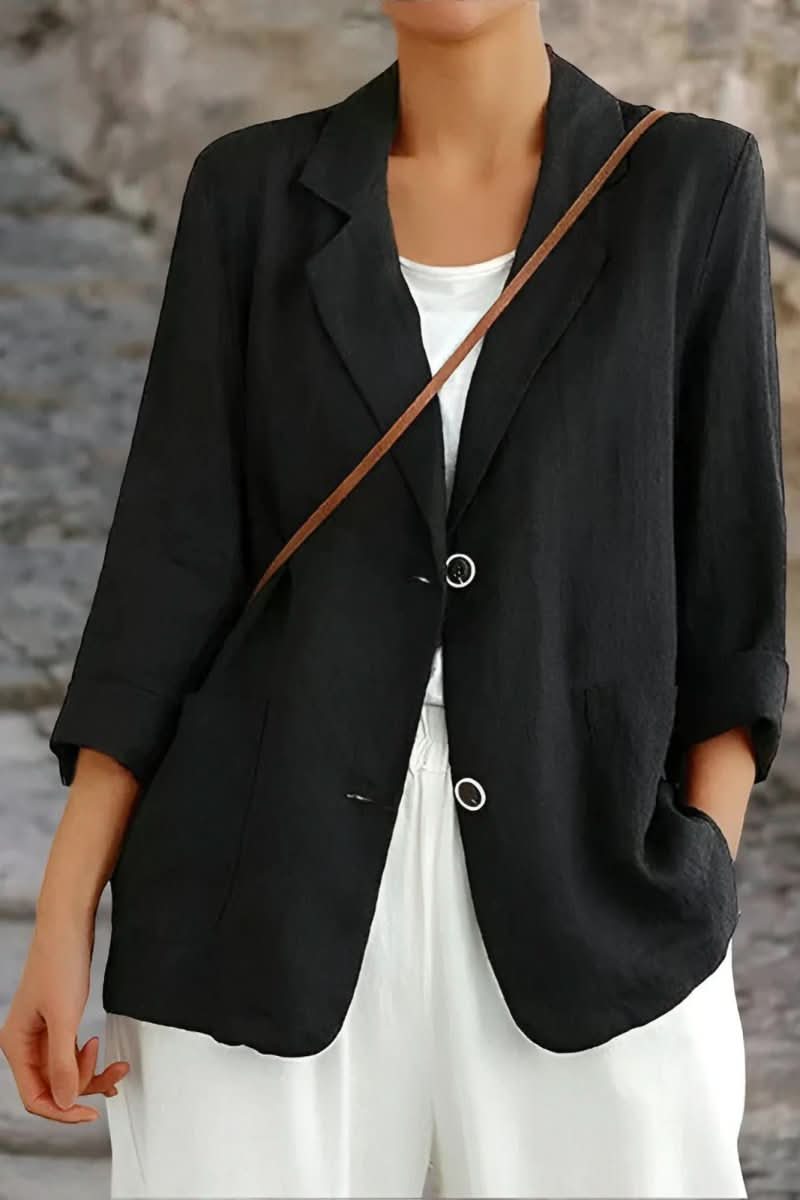 Stylish women's summer blazer with an open back, offering a lightweight, chic look for modern fashion.