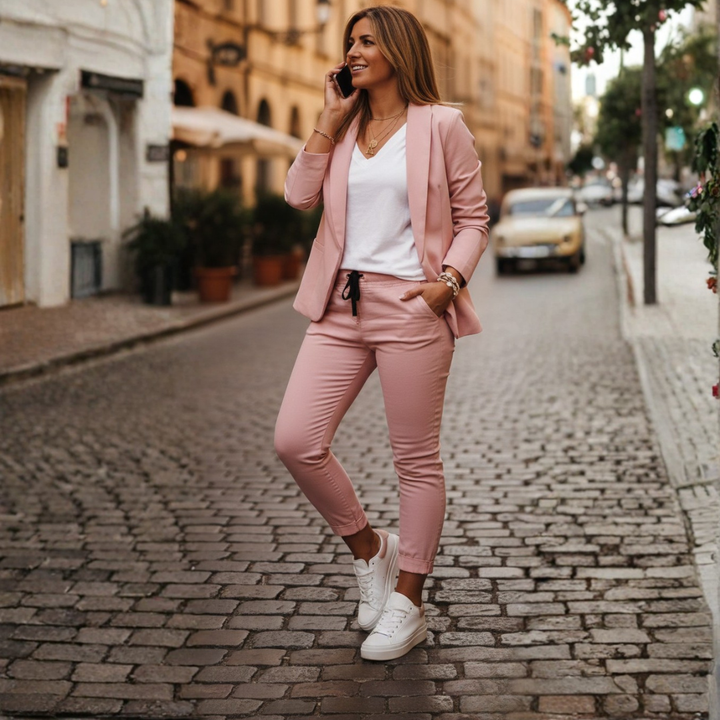 Elegant women's open front blazer and jogger set with chic ruched sleeves for a smart casual look.