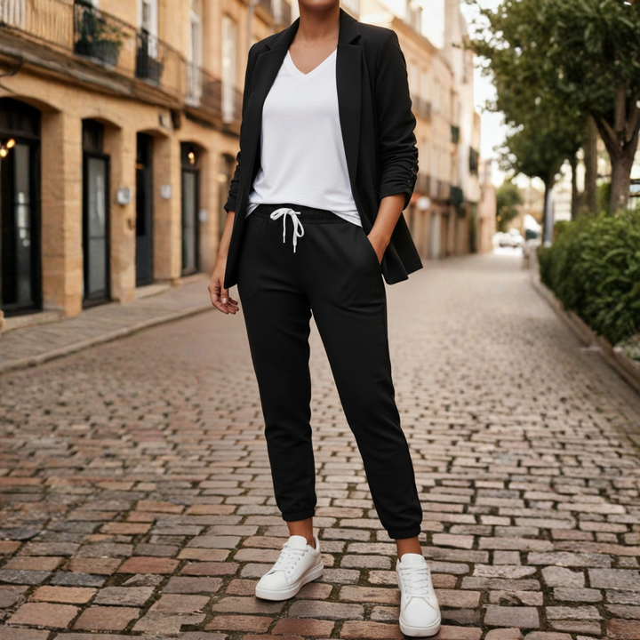 Beige women's elegant open front blazer & tailored jogger set with fashionable ruched sleeve details.