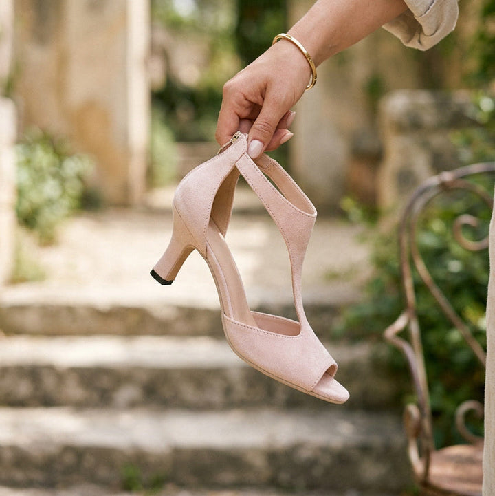 Fashionable women's orthopedic heels, expertly designed with cushioning for stylish, comfortable steps.