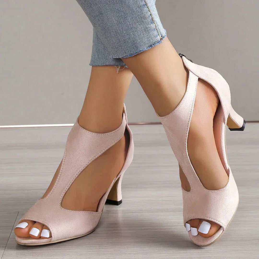 Elegant women's orthopedic peep-toe t-strap high heels for comfortable formal wear & special occasions.