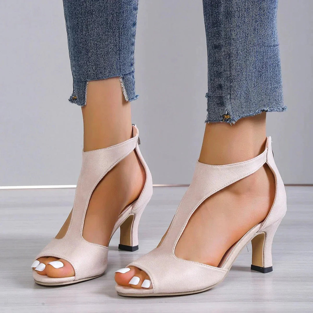 Comfortable women's orthopedic high heels with stylish peep-toe and T-strap design for all-day elegant support.