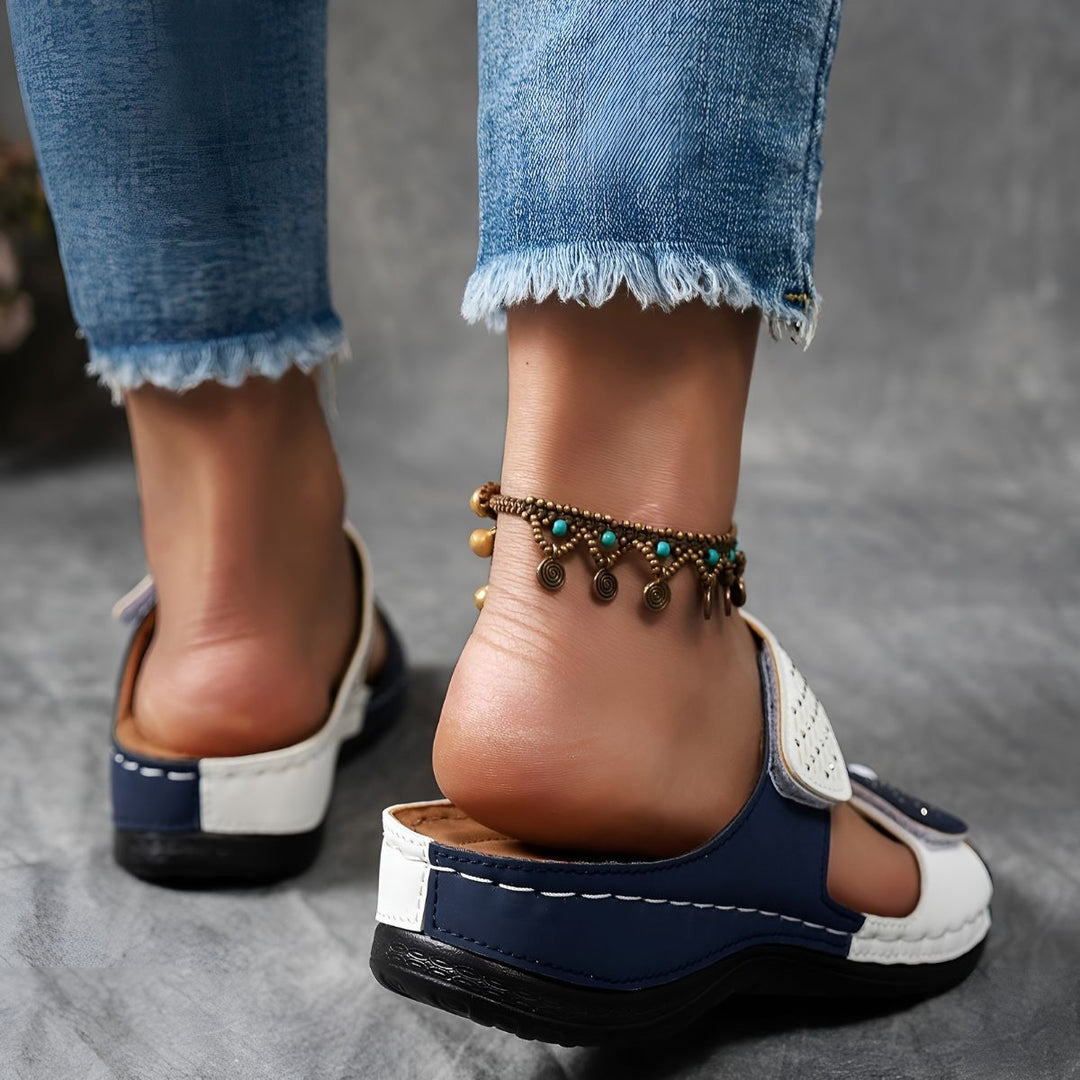 Refined women's supportive sandals, orthopedic arch support for elegant summer comfort.