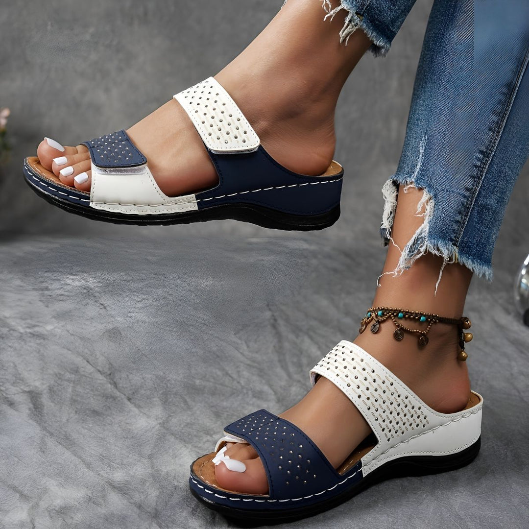 Orthopedic women's sandals, elegant design & arch support for comfortable daily wear.