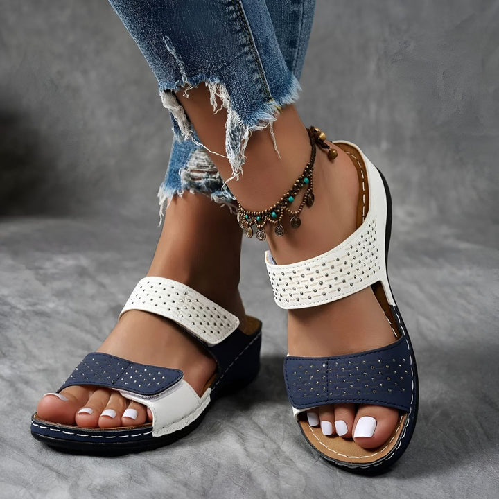 Fashionable women's orthopedic sandals, offering stylish comfort & arch support for summer.