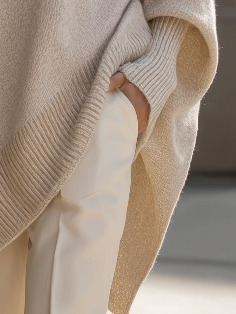 Soft women's oversized sweater. Elegant poncho with draped batwing sleeves. Cozy & stylish.