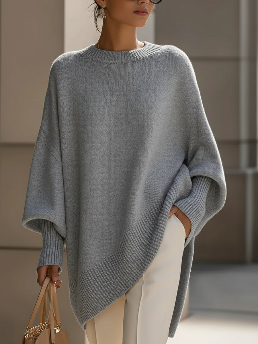 Cozy women's oversized cape. Soft poncho sweater with elegant drape & batwing sleeves for autumn.