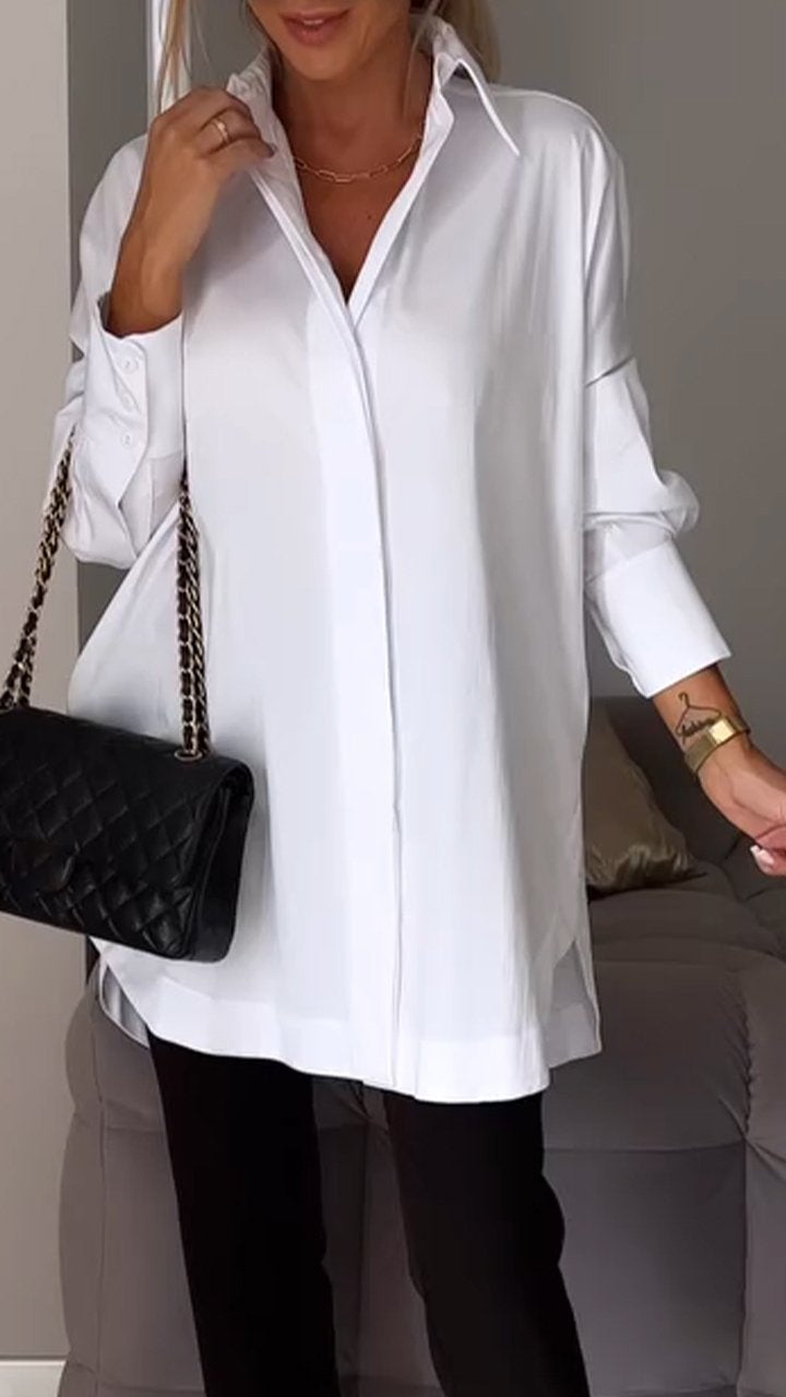 Elegant women's oversized collared blouse for a chic, relaxed fit. Perfect for versatile spring/summer styling.