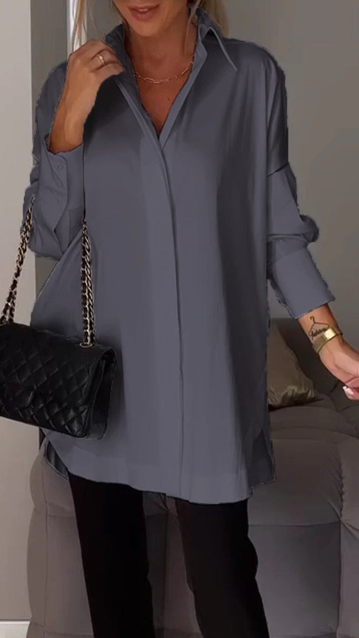 Elegant women's Blanca oversized blouse, featuring a chic collar and long sleeves for sophisticated styling.