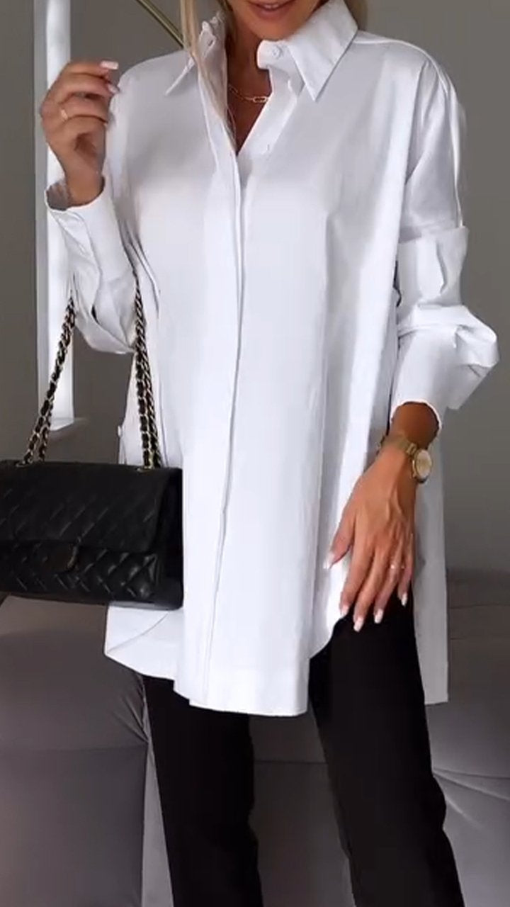 Professional women's collared workwear blouse, oversized with long sleeves. Chic and comfortable for the office.