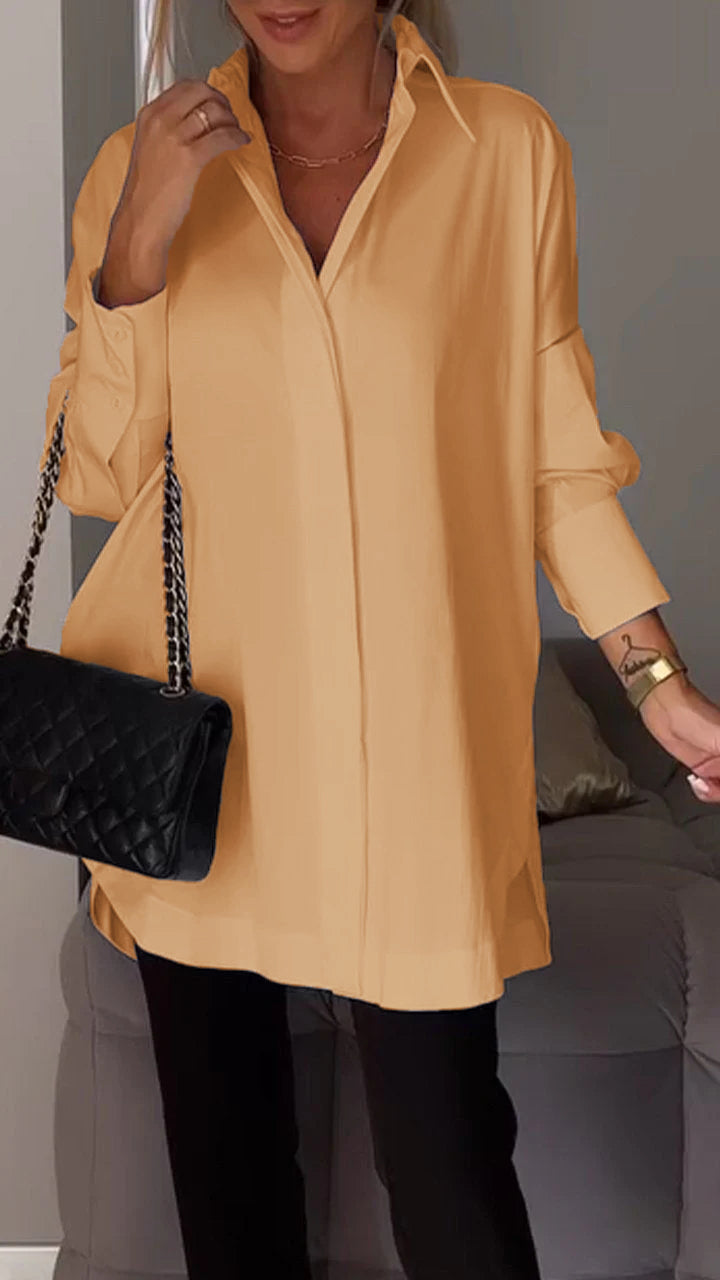 Effortlessly chic women's oversized collared blouse, a long-sleeve top for modern, versatile fashion.