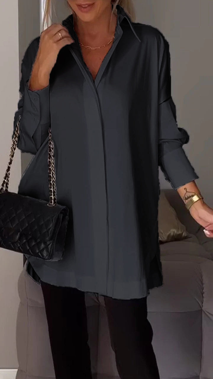 Comfortable women's oversized collared blouse, a relaxed fit long-sleeve top for elegant casual wear.