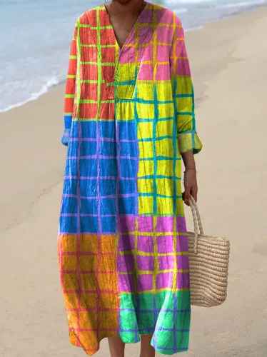 Vibrant women's elegant patchwork maxi dress featuring a stylish V-neck and long sleeves for a unique casual look.