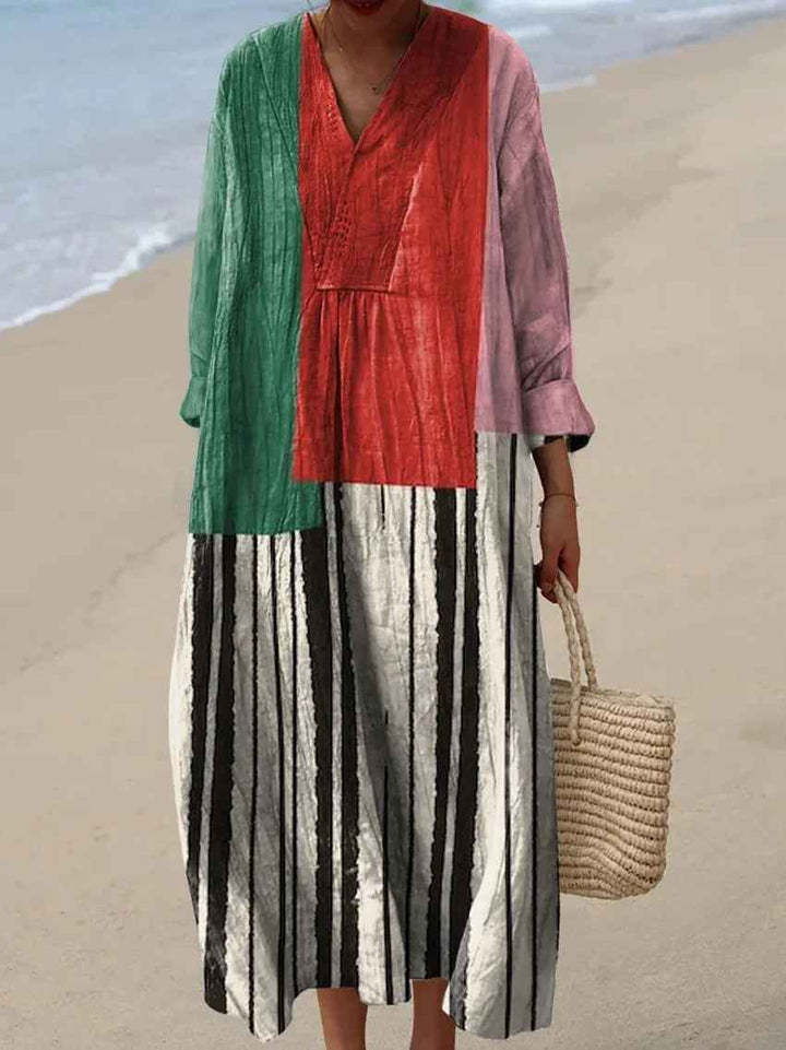 Comfortable women's colorful patchwork maxi dress. A vibrant, flowy, long-sleeve casual dress for summer and vacation.
