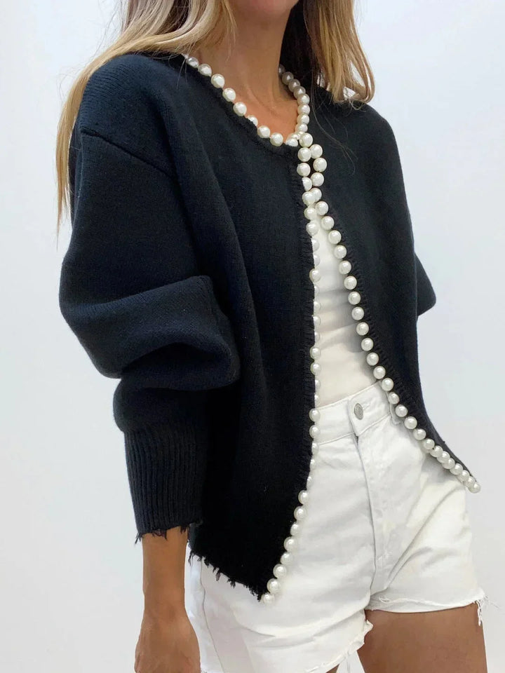 Stylish women's long sleeve pearl trim cardigan. Round neck, ideal for elegant fashion & chic versatile layering.