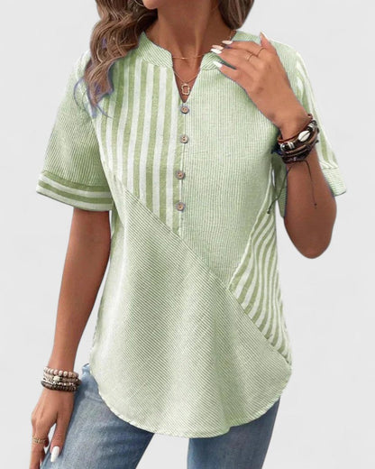 Women's blue striped relaxed fit blouse, comfortable and elegant, a versatile choice for modern fashion.