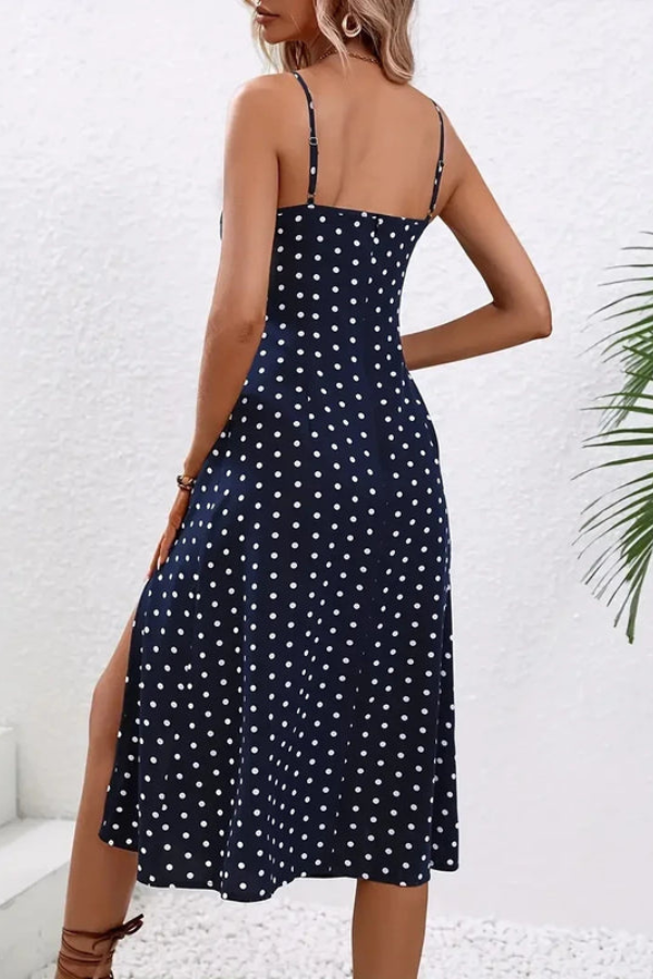 Versatile flowy midi dress for women, with elegant pleats and a stylish halter neck.