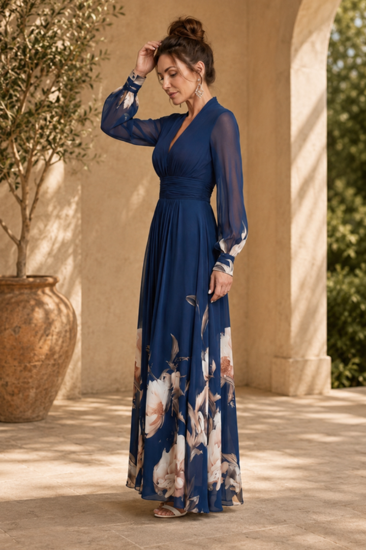 Stylish women's sheer sleeve maxi dress with pleats, ideal as an evening gown, party dress, or wedding guest attire.
