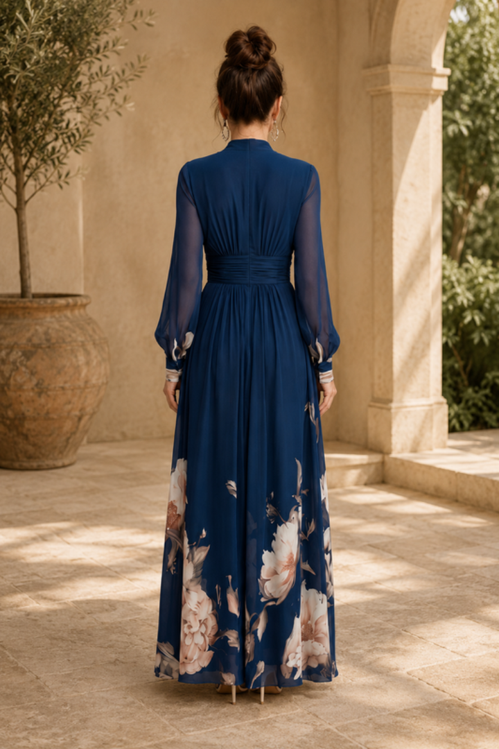Sophisticated women's pleated maxi dress featuring elegant sheer sleeves, suited for special occasions & formal wear.