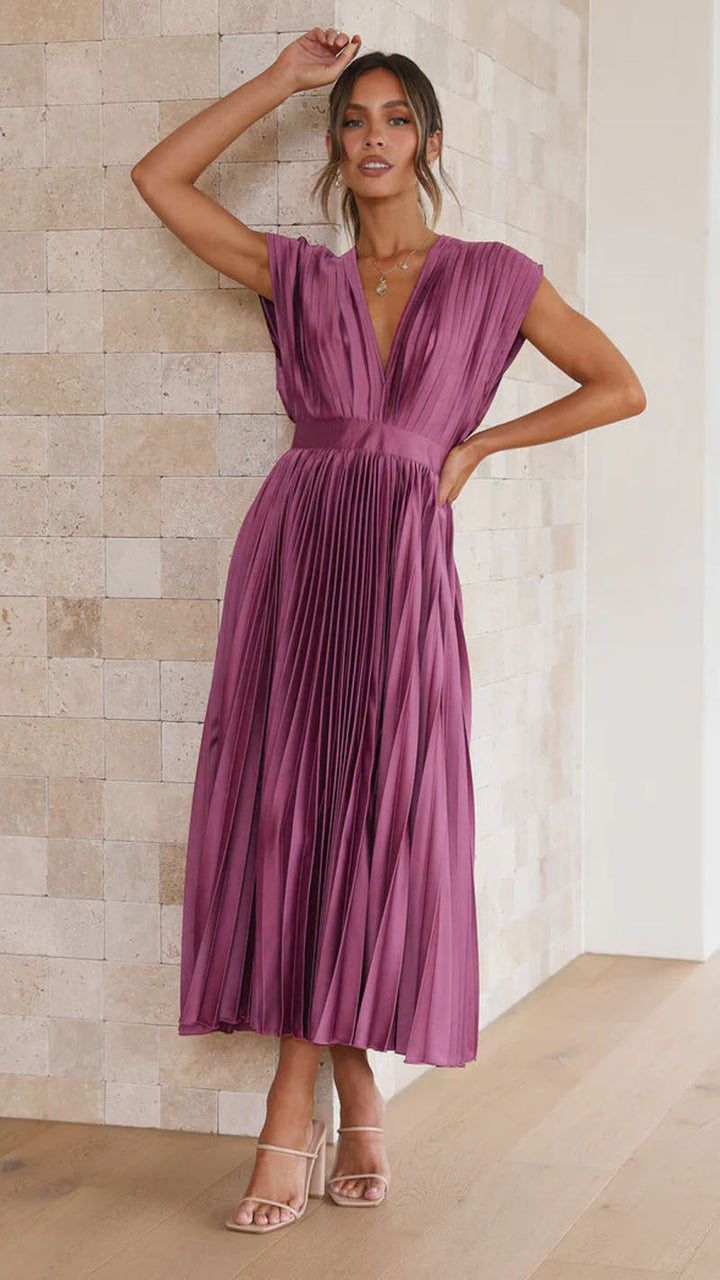 Chic women's pleated V-neck midi dress, an elegant and comfortable choice for summer events.