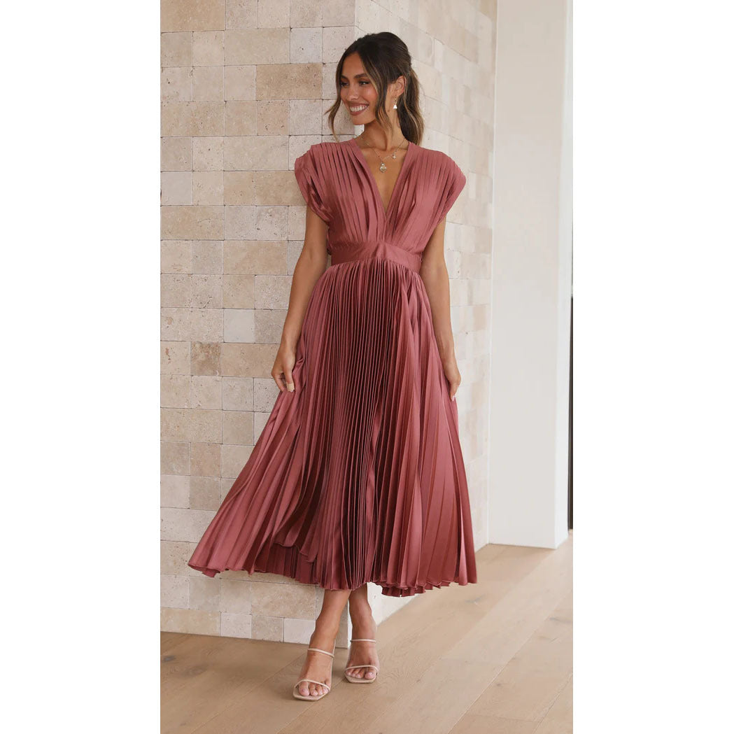 Women's elegant V-neck pleated midi dress, perfect for an evening occasion or stylish summer wear.