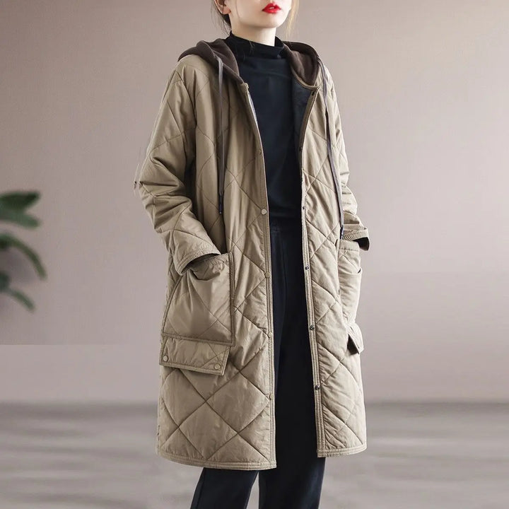 Cozy plus size women's winter jacket with hood. Elegant and warm outerwear for fall fashion.