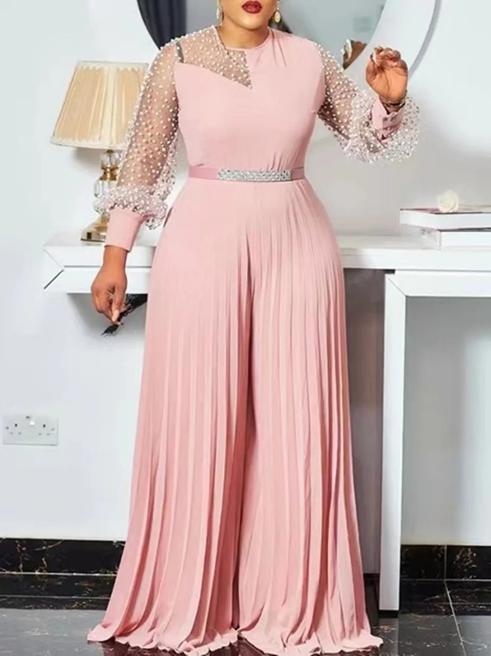 Stylish plus size women's pleated jumpsuit, a chic and comfortable long-sleeve design for any season.