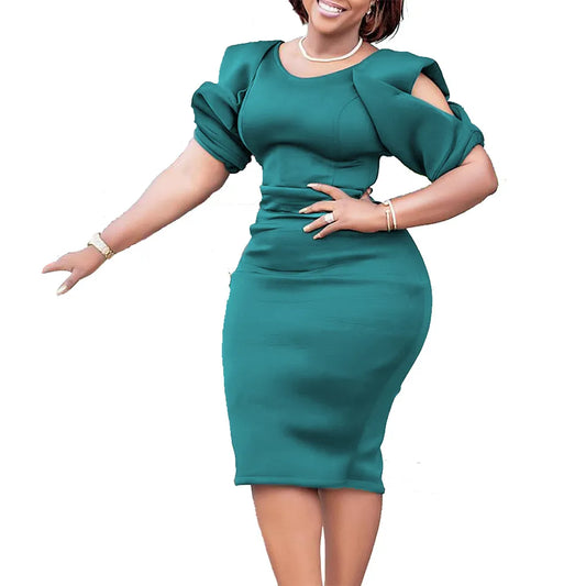 Elegant women's plus size puff sleeve knee-length dress, perfect for fall fashion and curvy figures.