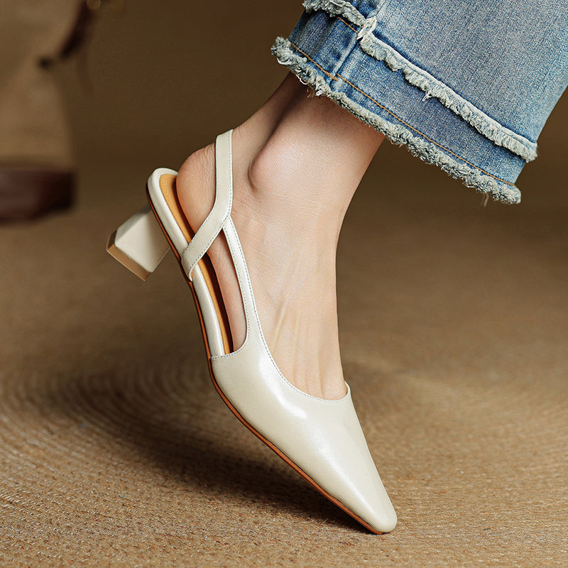 Sleek side profile of women's elegant pointed toe heels. Cushioned low heel for comfort & style. Perfect workwear.