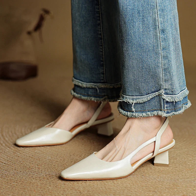 Front view of women's classic pointed toe slip-on heels. Elegant design for work & all-day comfort.