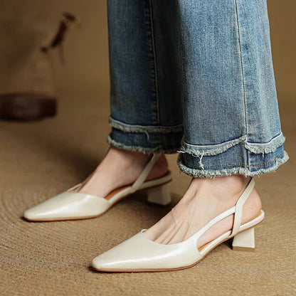 Front view of women's classic pointed toe slip-on heels. Elegant design for work & all-day comfort.