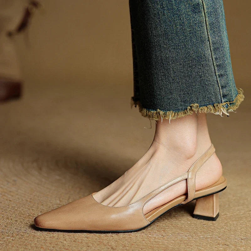 Professional women's workwear heels. Elegant pointed toe, low heel & cushioned for all-day comfort. Slip-on style.