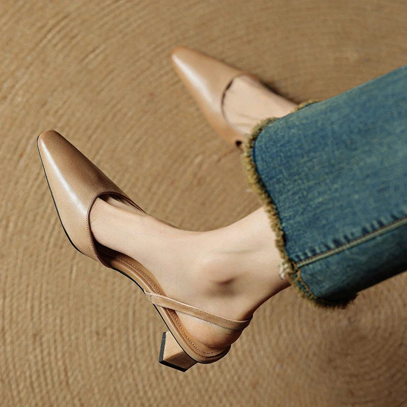 Women's comfortable low heel pointed toe shoes. Cushioned for all-day wear. Elegant slip-on dress heels.