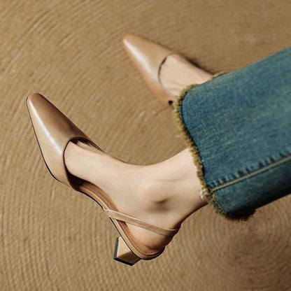Women's comfortable low heel pointed toe shoes. Cushioned for all-day wear. Elegant slip-on dress heels.