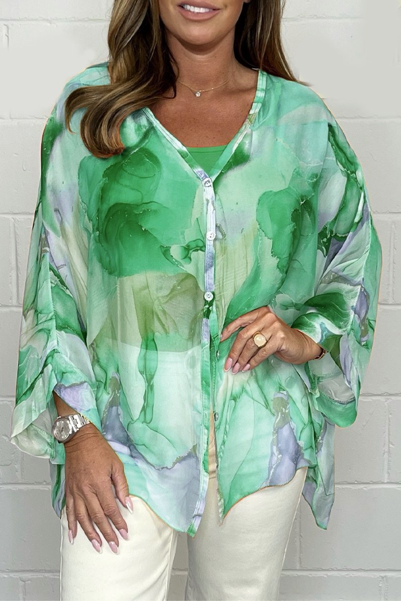 Stylish & comfortable women's printed top, relaxed fit, versatile for casual wear or sophisticated ladies fashion.