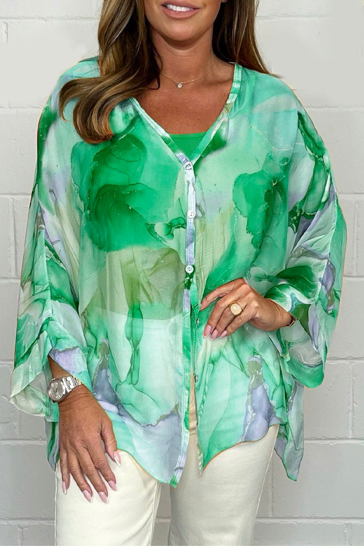 Stylish & comfortable women's printed top, relaxed fit, versatile for casual wear or sophisticated ladies fashion.