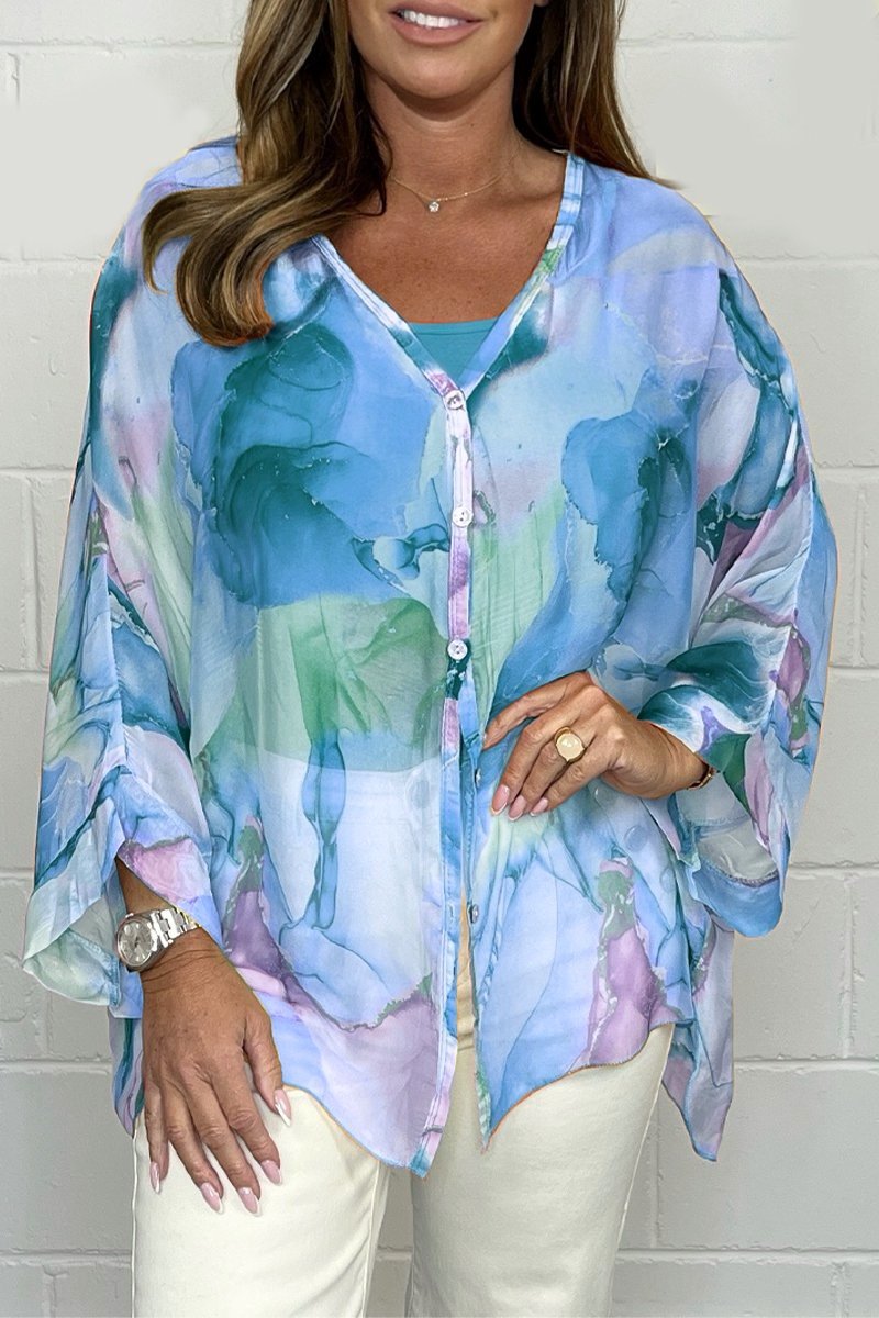 Flowy long sleeve women's printed blouse, lightweight & elegant, ideal for spring/summer fashion and office wear.
