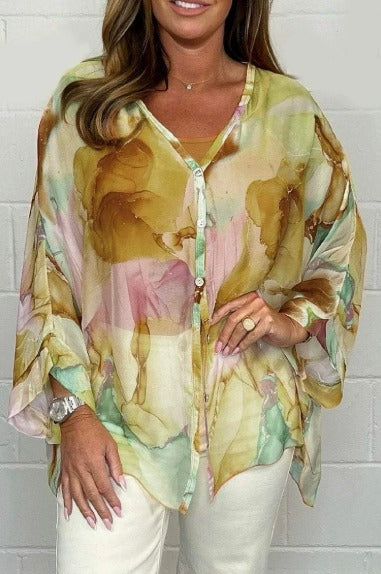 Vibrant printed women's long sleeve blouse, relaxed fit, perfect for versatile spring style & office comfort.
