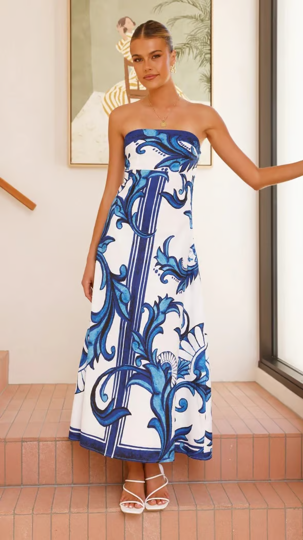 Chic vintage style flowy printed dress for women, offering comfortable and flattering everyday fashion.