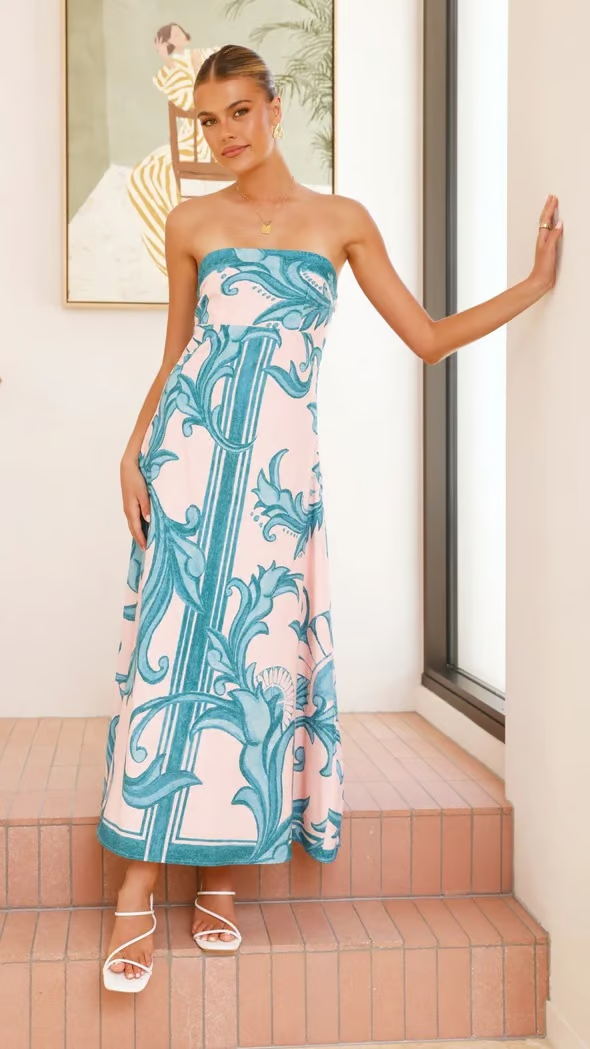 Flattering printed flowy short sleeve dress for women, embodying chic and comfortable vintage style.