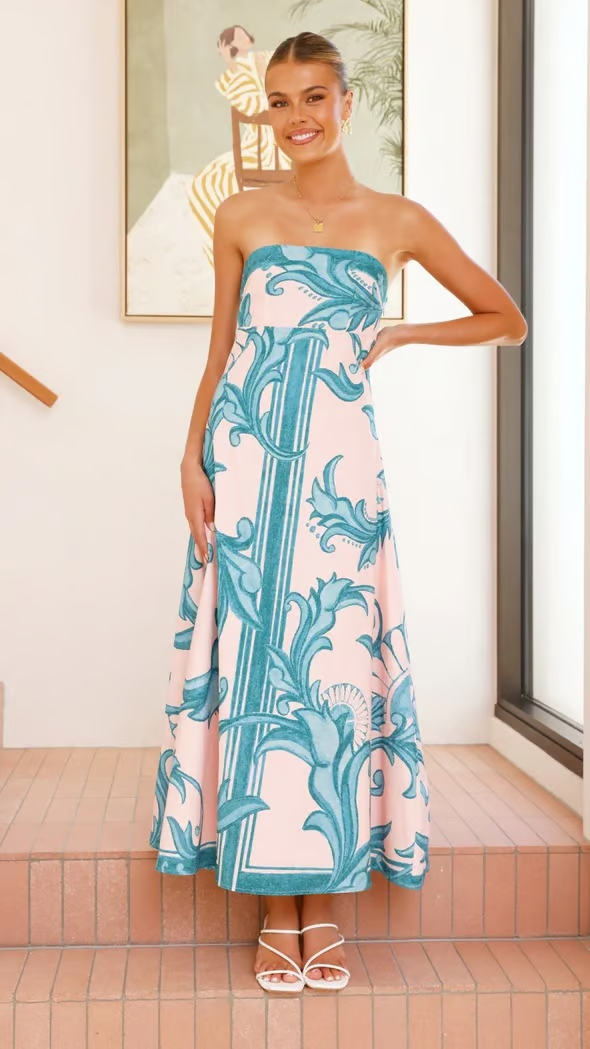 Beautiful printed flowy dress with elegant short sleeves for women, perfect for versatile everyday fashion.