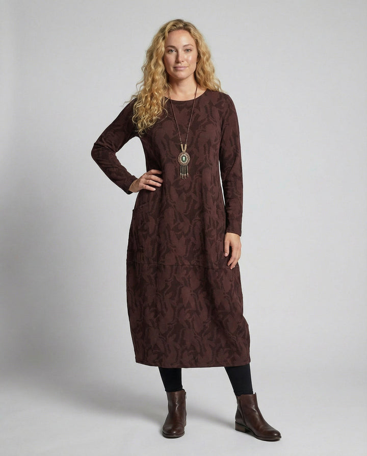Elegant women's printed long-sleeve midi dress, perfect for stylish fall and winter fashion. Comfortable & versatile.