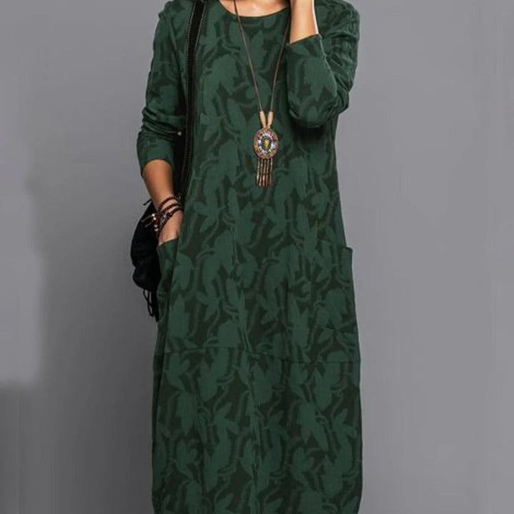 Comfortable women's long-sleeve midi dress with elegant print. Ideal casual fall/winter fashion, featuring practical pockets.