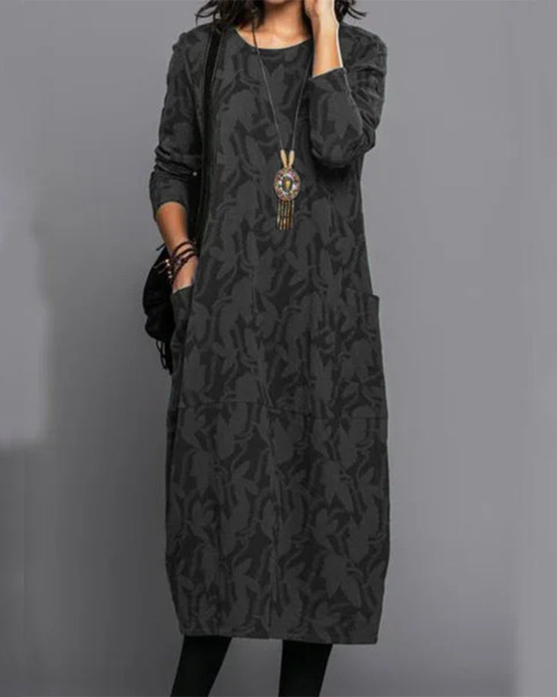 Beautiful printed long-sleeve midi dress for women. Elegant design makes it a perfect fall/winter statement piece.