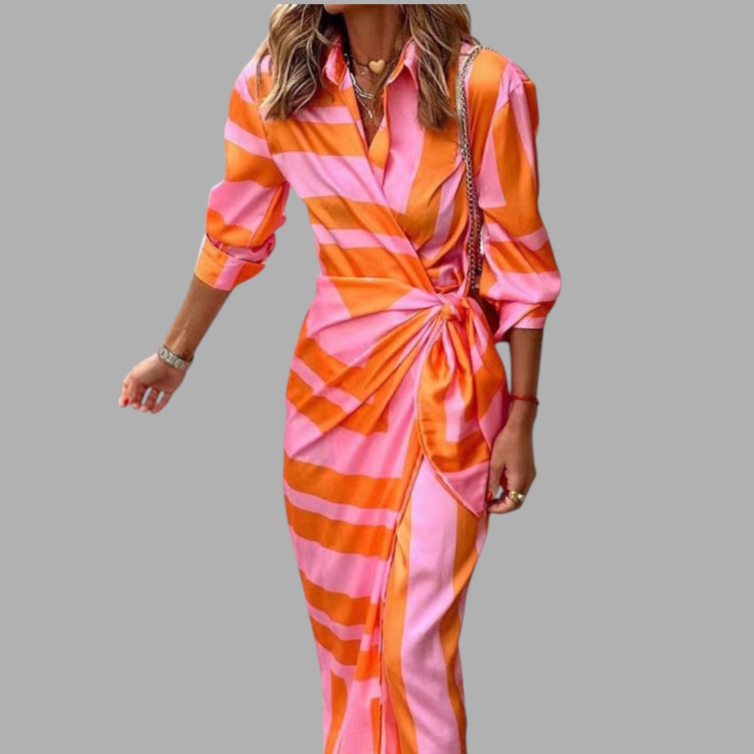 Elegant women's printed midi dress with a flowy silhouette, perfect for semi-formal occasions and comfort.