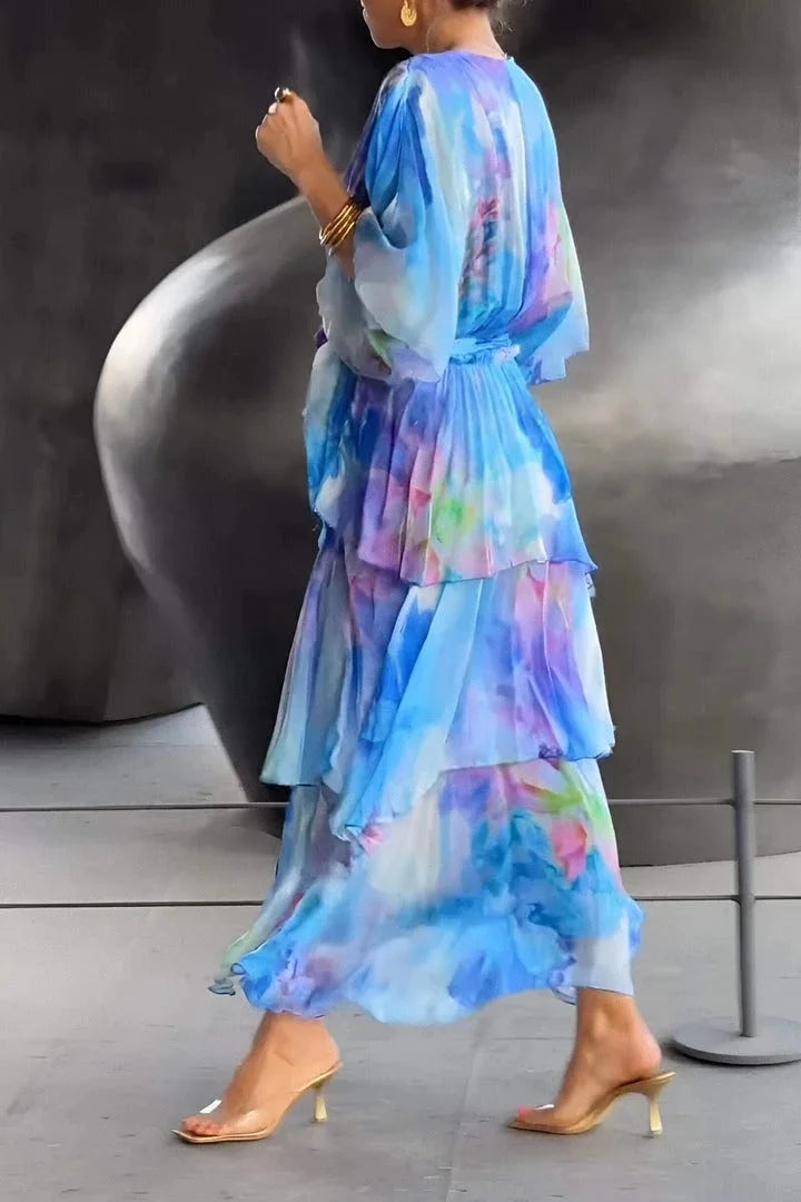 Beautiful tiered wrap dress for women, featuring a vibrant print, perfect for elegant parties.