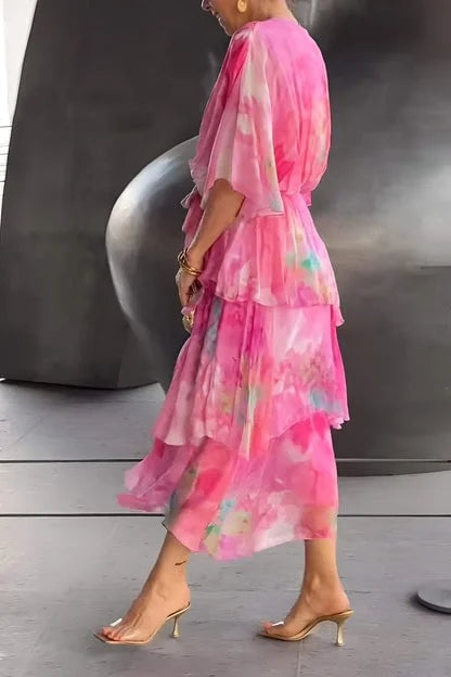 Light & flowy women's printed tiered wrap dress, a chic choice for summer parties and events.