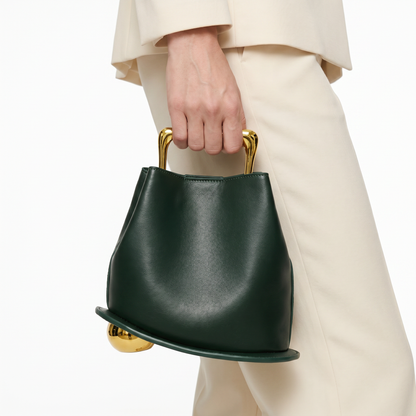 Elegant women's PU leather bucket bag in black, a sophisticated everyday fashion accessory.