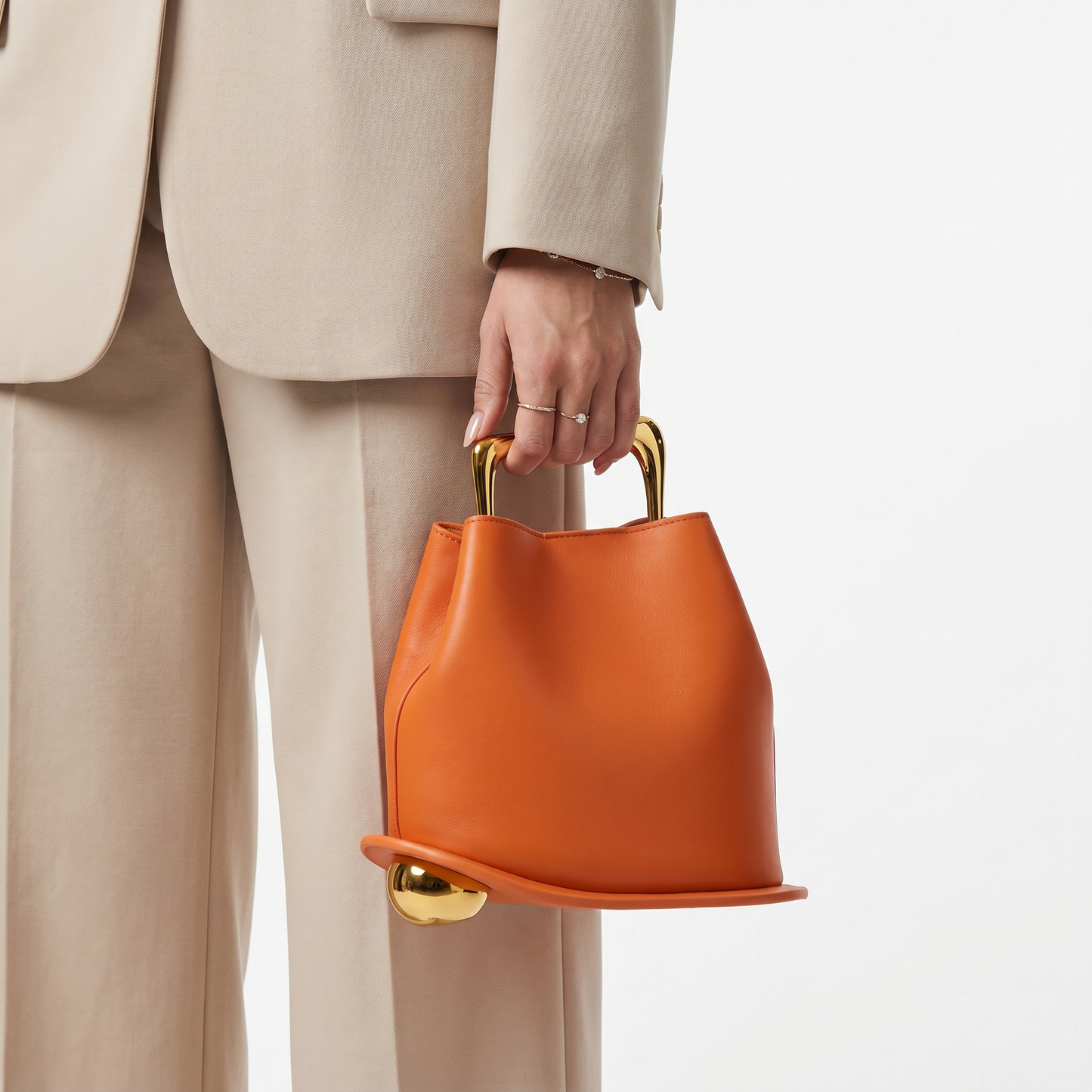 Sophisticated brown PU leather crossbody bucket bag, a chic women's everyday accessory.