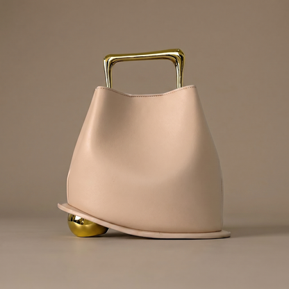 Sophisticated PU leather bucket bag in various colors like brown & orange, an elegant women's accessory.